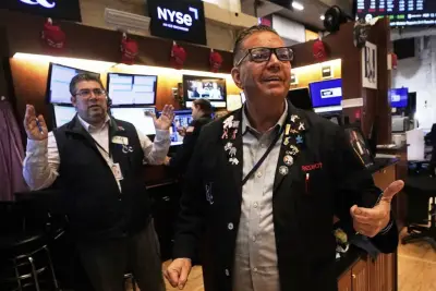 US stocks power within 3% of their record as Wall Street closes out a winning week